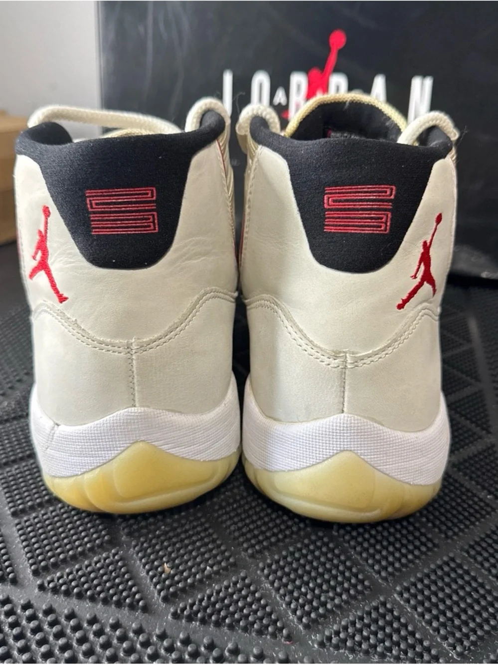 Jordan Men’s High-Top Sneakers in Cream with Red Accents